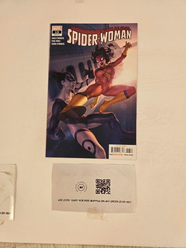 Spider-Woman #13 (Marvel Comics), raw comic book in NM condition — front cover