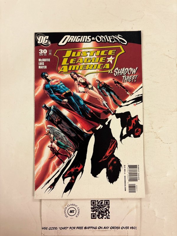 Justice League of America #30 (DC Comics, 2009), raw comic book in NM condition — front cover