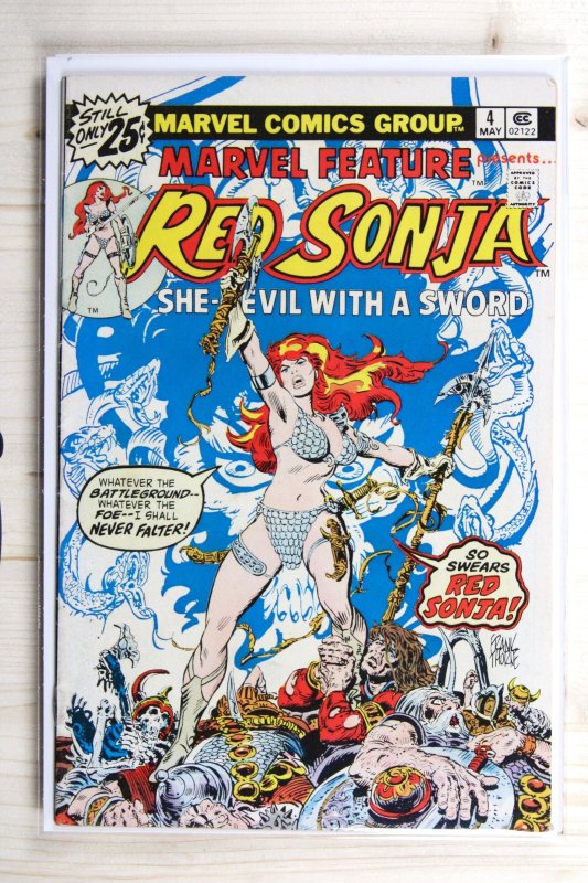 Marvel Feature: Red Sonja #4 (Marvel Comics, 1976), raw comic book in VF- 7.5 condition — front cover