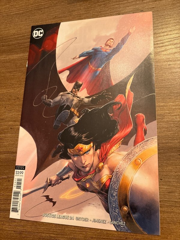 Justice League #24 (DC Comics), raw comic book in NM condition — front cover