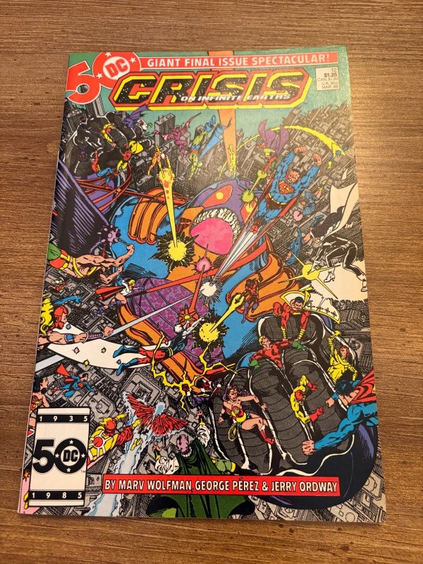 Crisis on Infinite Earths #12 (DC Comics, 1986), raw comic book in NM condition — front cover