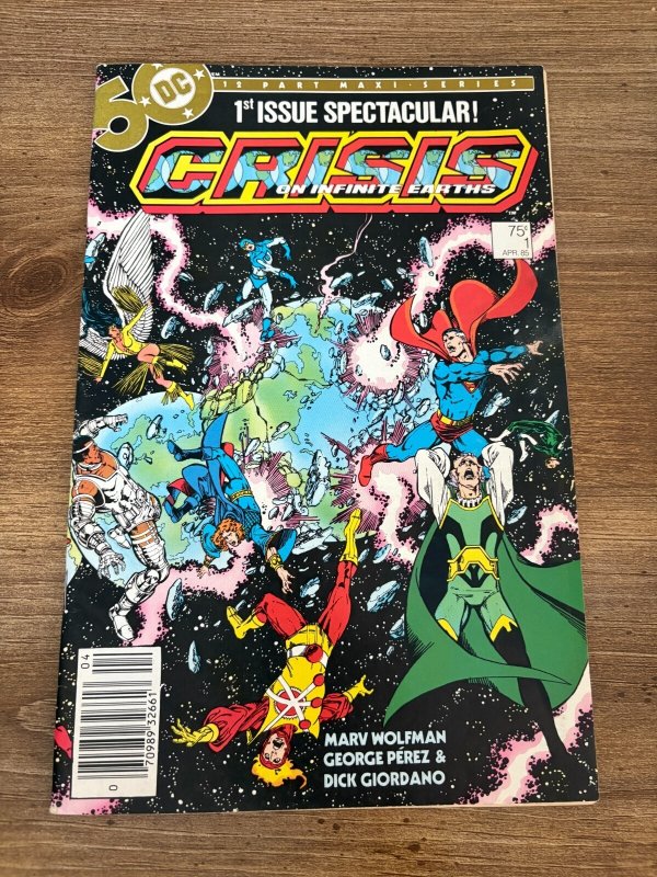 Crisis on Infinite Earths #1 (DC Comics, 1985), raw comic book in VF condition — front cover