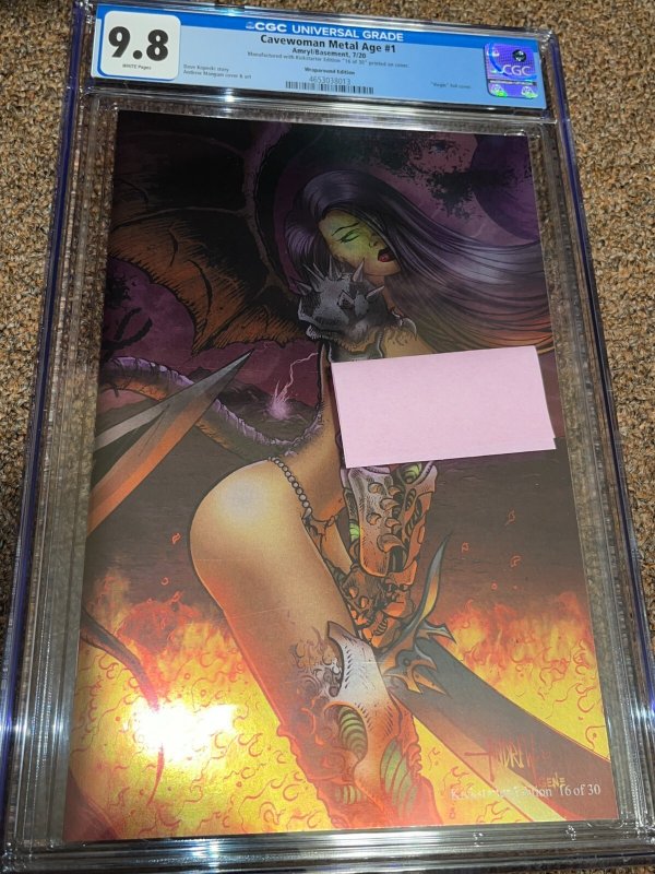 Cavewoman Metal Age #1, CGC 9.8 graded comic book, Universal Blue label — front cover in its holder
