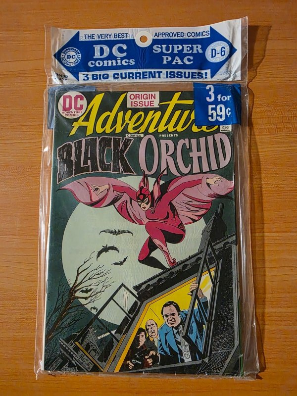 DC 3 Pack Sealed D-6 Adventure Comics #428 Flash #222 Action #425 ~NM~ 1973 (DC Comics, 1973), raw comic book in NM condition — front cover