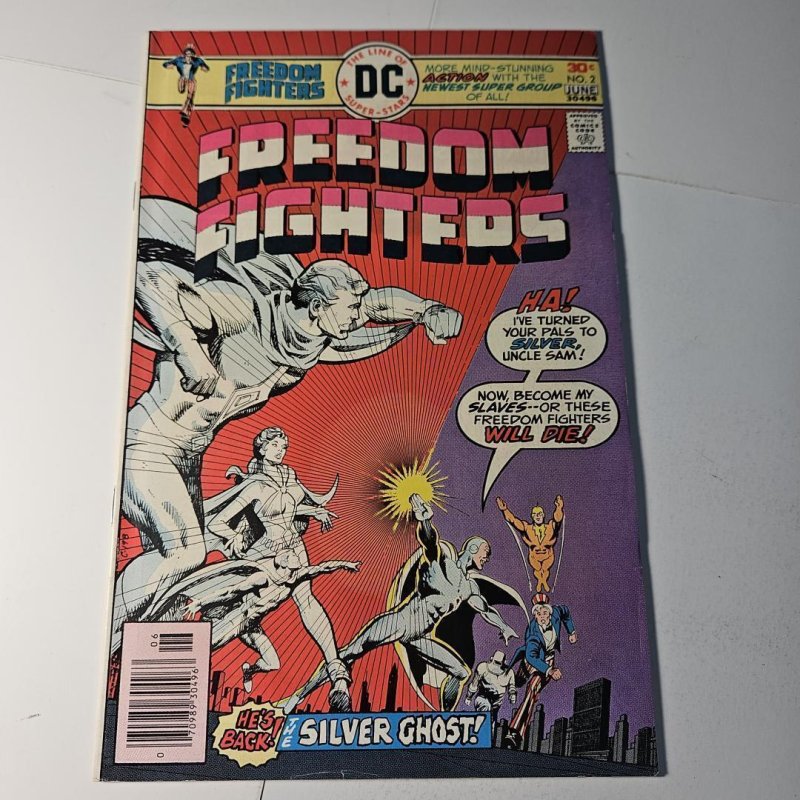 Freedom Fighters #2 (DC Comics, 1976), raw comic book in VF+ condition — front cover