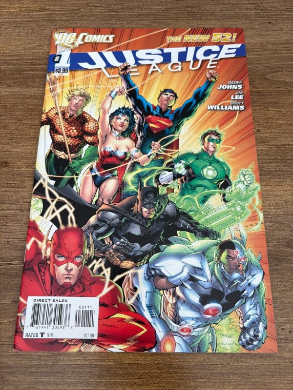 Justice League #1 (DC Comics), raw comic book in NM condition — front cover