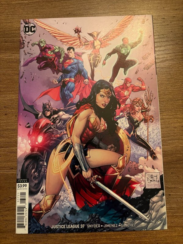 Justice League #37 (DC Comics), raw comic book in NM condition — front cover