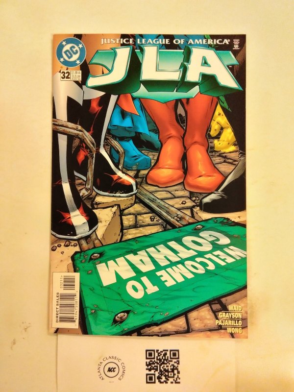 JLA #32 (DC Comics), raw comic book in NM condition — front cover